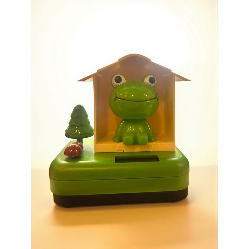 Neşeli Kurbağa Evi Solar Sallanan Figür – Araba ve Masa Dekoru (10 cm)